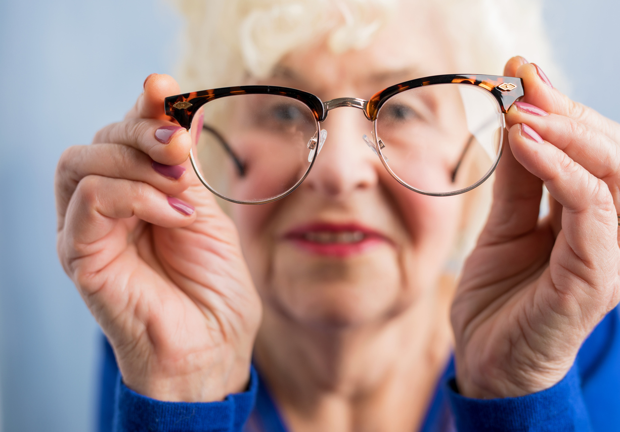 Elderly Woman Looking Through Glasses Rehab First